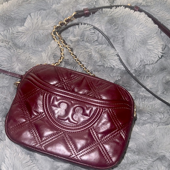 Small Fleming Camera Bag by Tory Burch.Burgundy quilted soft genuine leather.